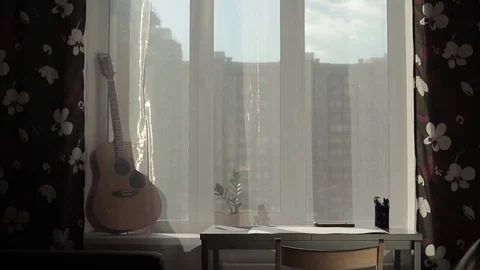 Girl sits at the table Stock Footage 69989031