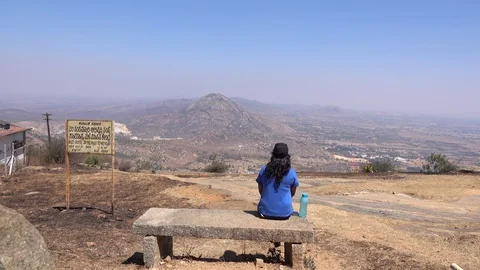 Girl sitting on a  bench Stock Footage 87662914