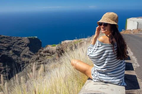 Girl sitting looking at the view, La Palma island Stock Photos