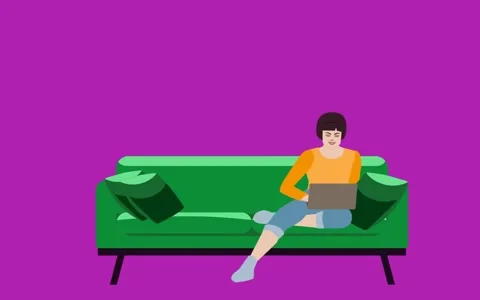 Girl sitting on sofa with laptop Stock After Effects