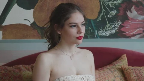 Girl sitting at the table Stock Footage 73034201