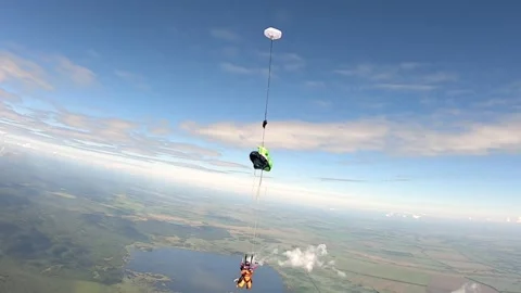 A girl skydiving with an instructor Stock Footage 279244554
