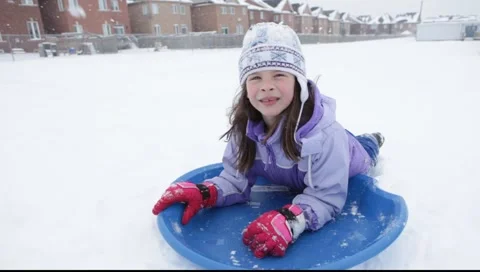 Girl sledging Stock Footage 1030570
