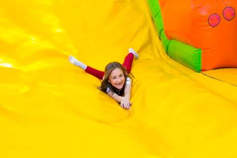 Girl Slide Down Stock Photos
