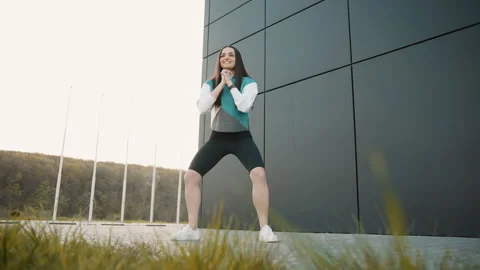 Girl with smart watch doing exercise outdoor Video stock 252502660
