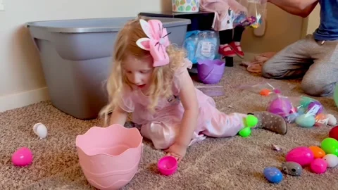 Girl Smashes Easter Egg And Makes Trick Shot, Berthoud, Colorado, USA - 20 Apr 2 Stock Footage 307437267