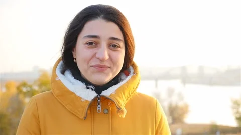 The girl smiles at the camera. Close-up Stock Footage 118675673