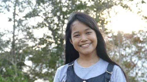 Girl smiling at camera Stock Footage 64410902