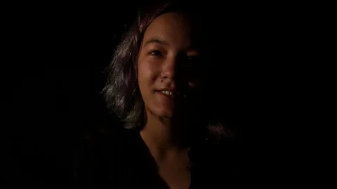 Girl smiling, interacting with camera Stock Footage 121137888