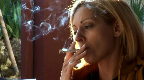 women smoking cigarettes videos 20+ Beautiful Slim Woman Cigarette Stock and Royalty-Free Footage Beautiful Woman Smoking Cigarette Outdoors