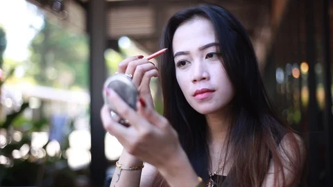 Girl is Smoothing Her Eyebrows Stock Footage 107561668