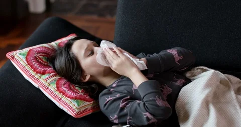 Girl sneezing Stock-Footage 130146121