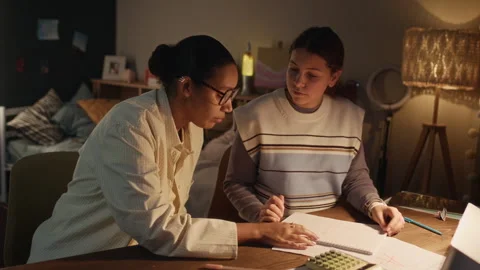 Girl Solving Math Problem and Showing Tutor Stock Footage 329668474