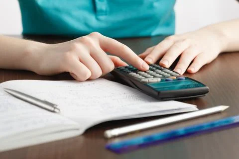 Girl solving a math problem Foto stock
