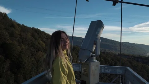 Girl is spending time in Skypark. Young lady enjoy view of marvelous canion Video stock 107917841