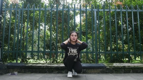 Girl Squat Jump Stock Footage 124510503