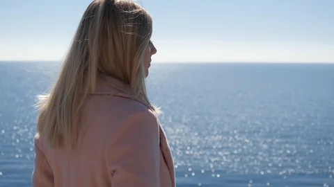 Girl squints in the sun Stock Footage 105792291