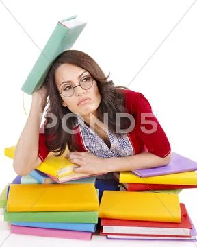 Girl with stack color book . Stock Photos