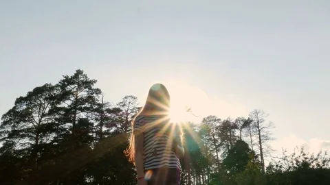 Girl is standing in the clearing 스톡 동영상 80117957