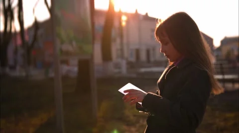 Girl standing using a tablet Stock Footage 48655636