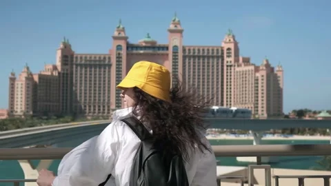 girl-stands-front-atlantis-hotel-footage-235929283_iconl.jpeg