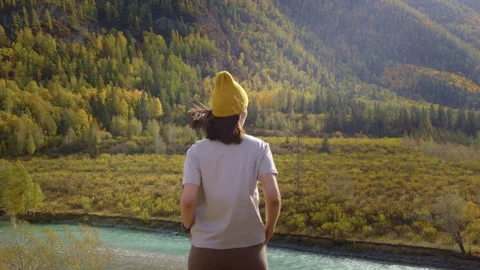 A girl stands in front of the forest Stock Footage 288438486