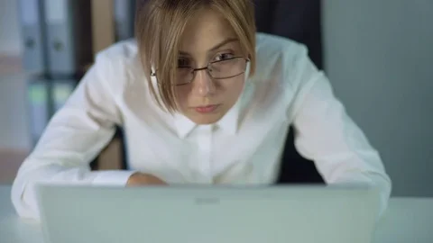 Girl staring at computer screen with eye... | Stock Video | Pond5