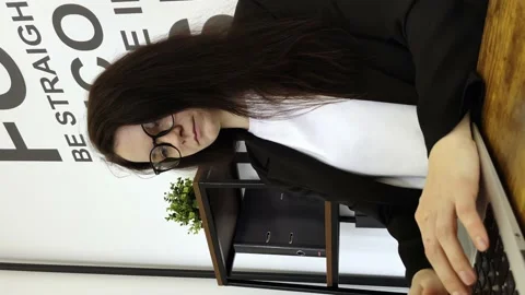 The girl starts working on the computer, working in the office Stock Footage 239178070