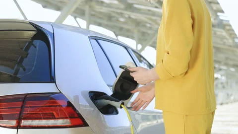 Girl stopping charging using app on mobile phone smartphone. Eco friendly 스톡 동영상 201001463