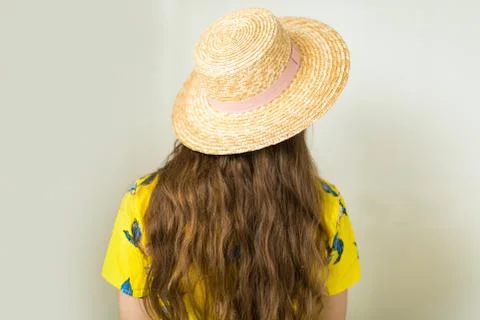 Girl in a straw hat Stock Photos