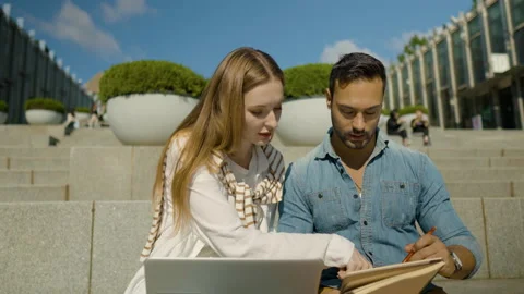 Girl Student Help To Classmate To Correct Mistakes, fix code in program Stock Footage 219406919