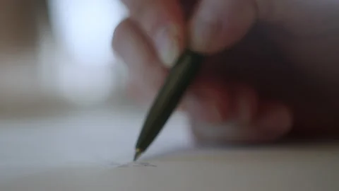 Girl student makes notes in a notebook. Close up hand of writer. Stock Footage 145262936