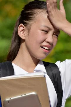 Girl Student Memory Problems With Notebooks Foto stock
