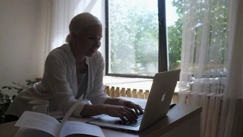 Girl student working at a computer Stock Footage 136733542