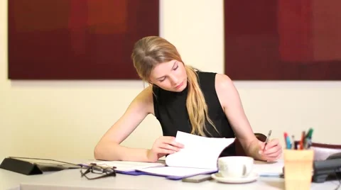 Girl Studies and writes notes Stock Footage 42139155