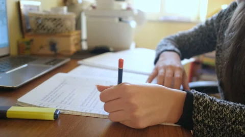 Girl studying at home while use notebook for online lesson,covid-19 pandemic Stock Footage 147413862