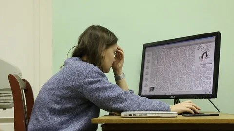 Girl studying in the library Stock Footage 105829646