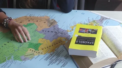 South America Girl Stock Video - Girl Studying South America Map Footage 070088938 Iconl