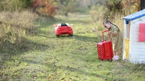 Girl with a suitcase Stock Footage 56261248