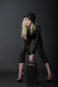 Girl with suitecase Stock Photos