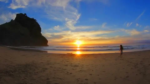 Girl on the Sunset Beach Video stock 67979302