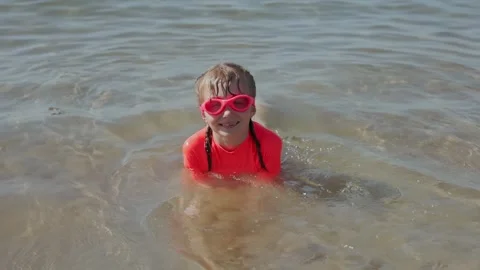 Girl in the surf Video stock 256315511