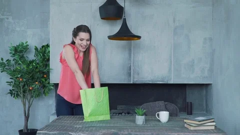 The girl is surprised by the gift Stock Footage 79102120