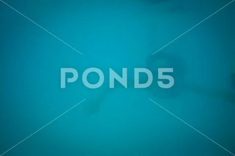 Girl Swimming Underwater Stock Photos