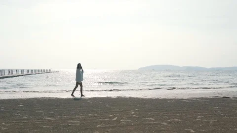 girl in a swimsuit on the ocean | Stock Video | Pond5