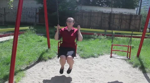 Girl on a swing Stock Footage 50316241