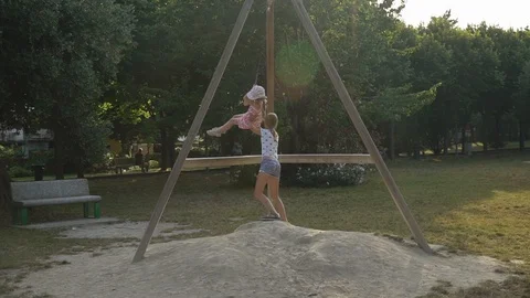 Girl on a swing Stock Footage 98305066