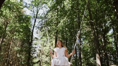 Girl on a swing Stock Footage 278290358