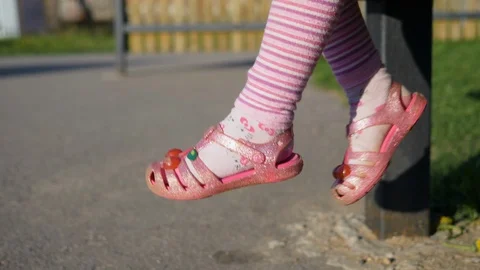Girl swinging her legs Video stock 101260341
