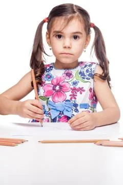 Girl at table Stock Photos